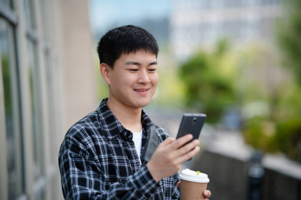 istock Adult male student on university campus 2157766473