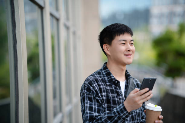 istock Adult male student on university campus 2157766484