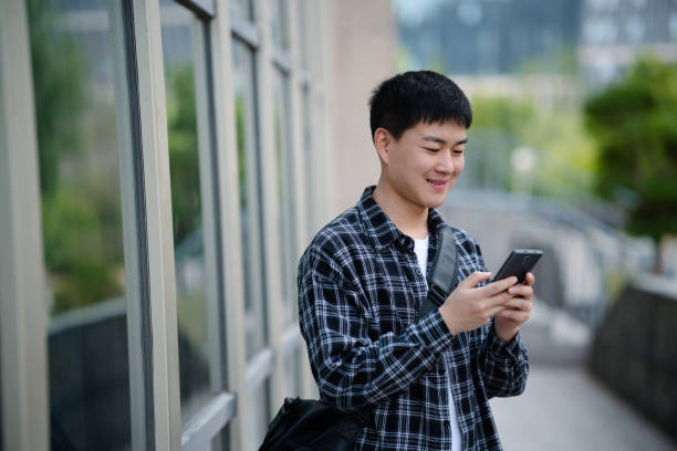 istock Adult male student on university campus 2157766502