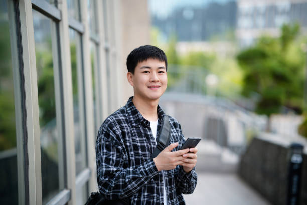 istock Adult male student on university campus 2157766521