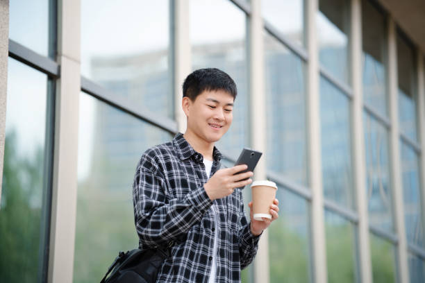 istock Adult male student on university campus 2157766620
