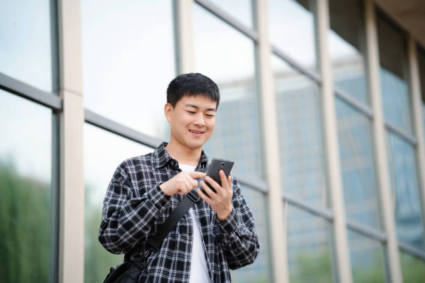 istock Adult male student on university campus 2157766630