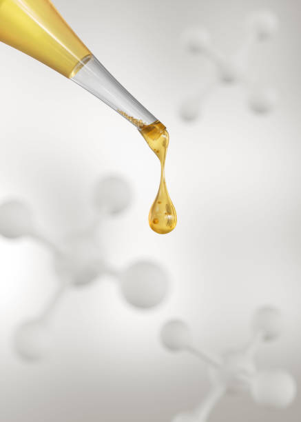 istock Cosmetic pipette with Cosmetic Essence oil Liquid drop with molecule on a Clean background. 2157775379