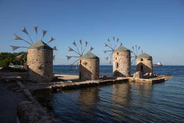 istock Old windmills by the beach, Chios island, Greece. 2157780427
