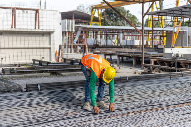 istock Foreman and workers in a construction factory 2157781719