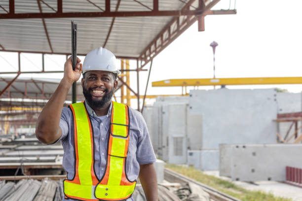 istock Foreman and workers in a construction factory 2157781745