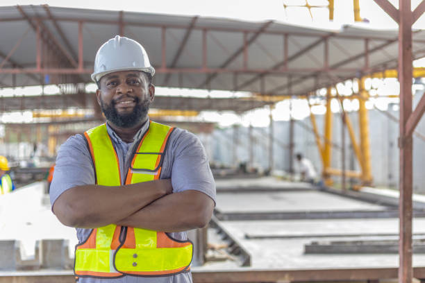 istock Foreman and workers in a construction factory 2157781756