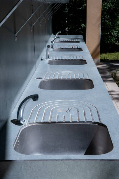 istock Sanitary facilities. Wash basins on the campsite 2157782698