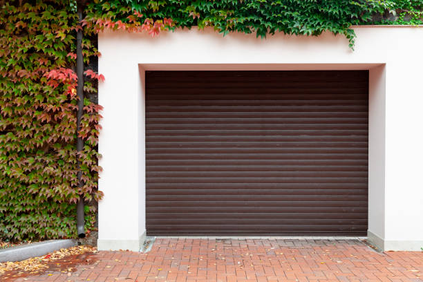istock Roller gate to the yard on an autumn day 2157782950