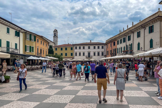 Lazise, Italy. June 15th, 2024: Square in Lazise in North East Italy. Full of tourists