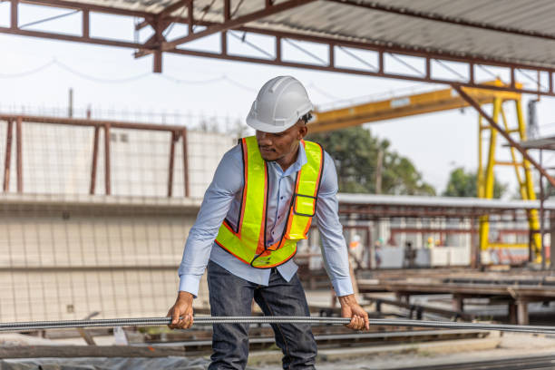 istock Team of workers in a construction factory 2157784251