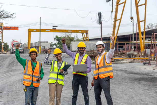 istock Team of workers in a construction factory 2157784282