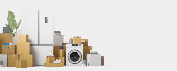 istock Cardboard boxes and home furniture with equipment, relocation. Copy space 2157784964