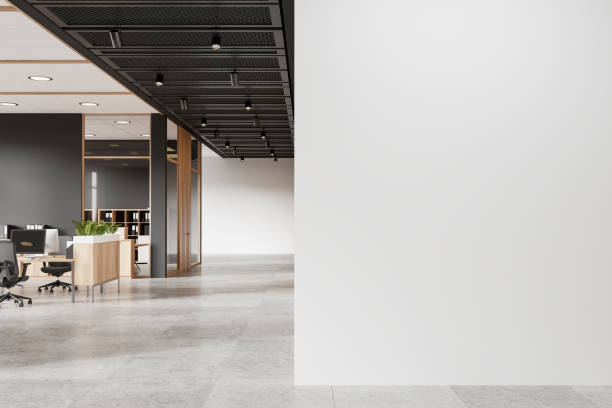 istock Office interior with empty white wall on the right, modern furniture and decor, light setting, office design mockup. 3D Rendering 2157784981