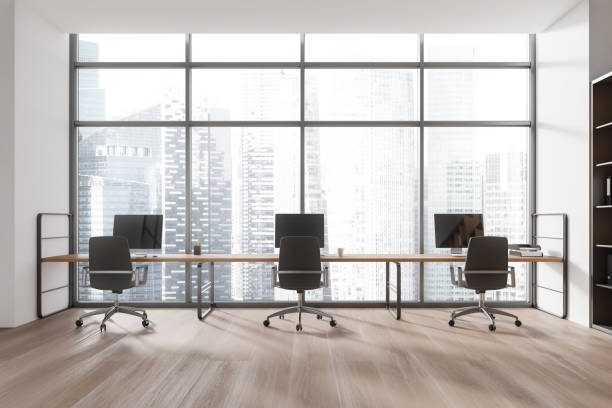 istock Modern office interior with wooden desk, chairs, and large windows overlooking a cityscape, light. 3D Rendering 2157785040