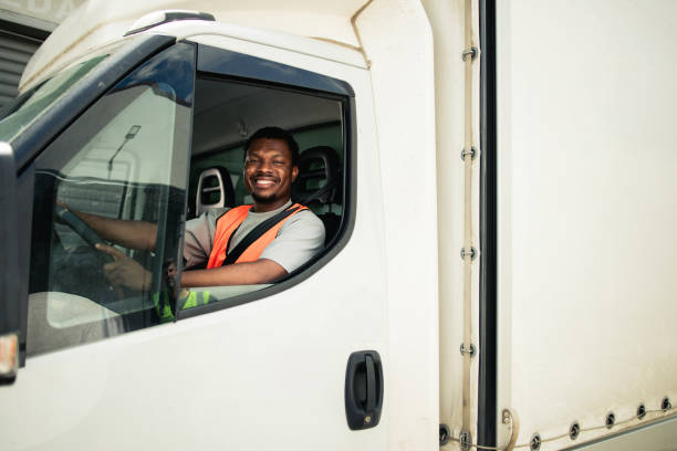 istock African American truck driver smiling at his workplace 2157785573