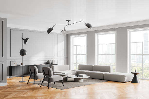 istock Stylish home living room interior with couch and drawer, panoramic window 2157785609