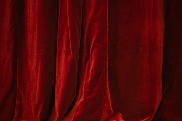 istock Red curtain in theatre 2157786690