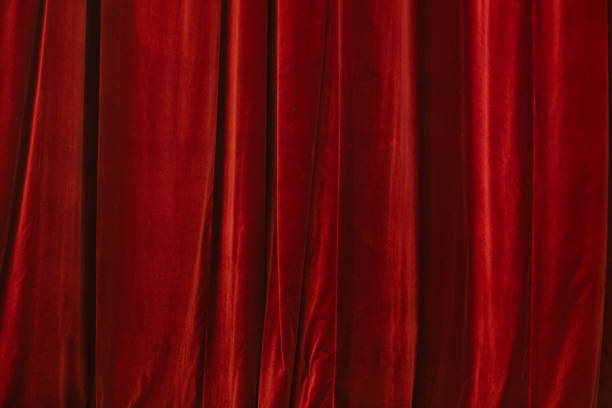 istock Red curtain in theatre 2157786824