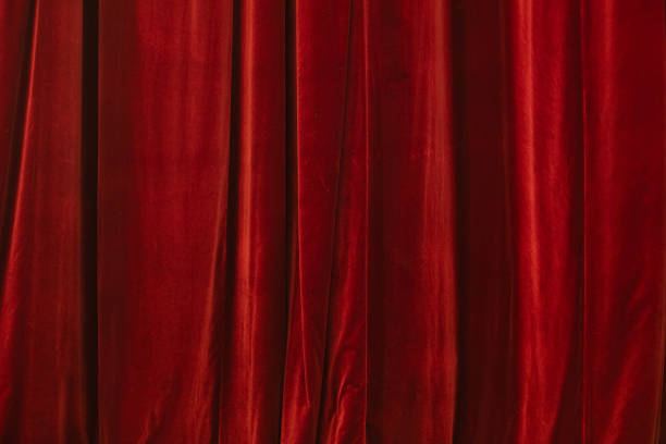 istock Red curtain in theatre 2157786826