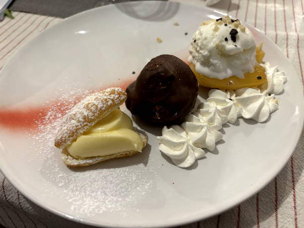 istock trio of desserts on a plate 2157793152