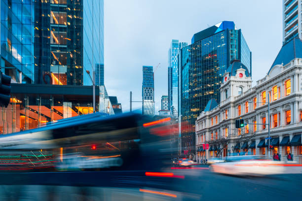 Rush hour in down town Auckland City at the corner of Queen street and Custom street, Auckland, New Zealand.