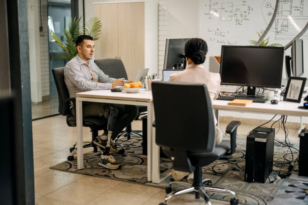 istock Colleagues work together in the office 2157794098