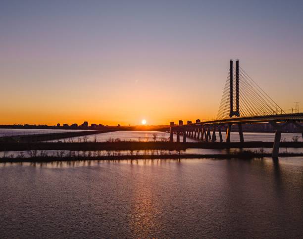 istock A beautiful sunset view of a modern cable-stayed bridge over a calm river 2157796000