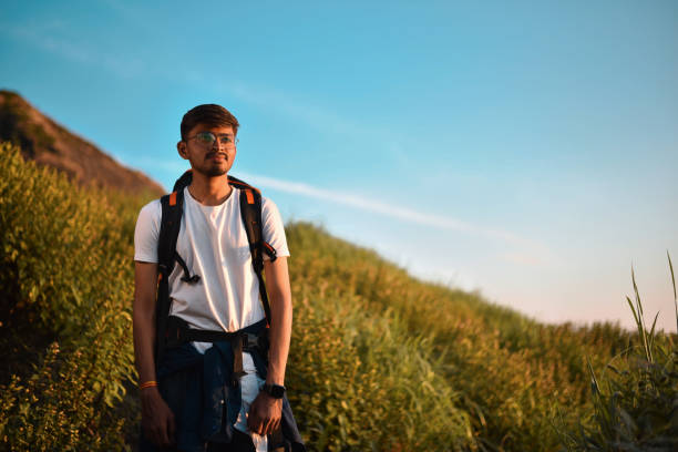 istock A young man trekker's evening in nature 2157798102