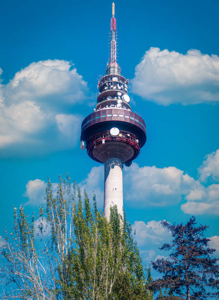 Vienna, Austria - 14 December 2023: The top of the DonauTurm observation tower with an observation deck, revolving café and restaurant