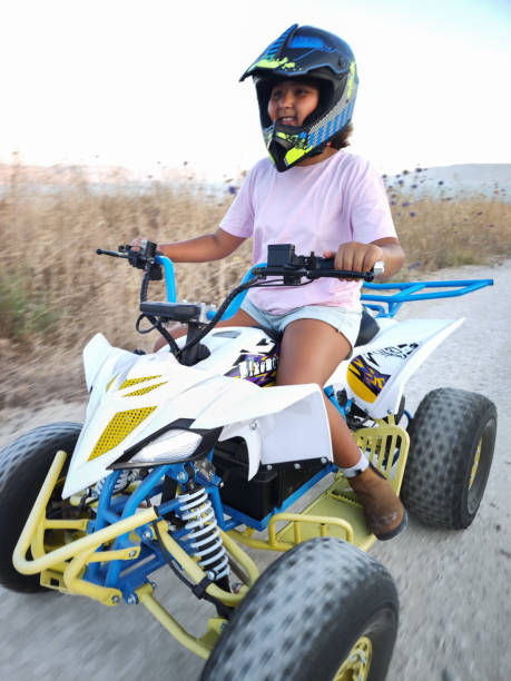 istock Childhood Adventures on an ATV. 2157801247