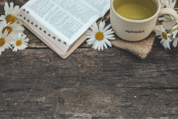 istock Cup with the inscription blessed and open Bible, Christian concept 2157801444