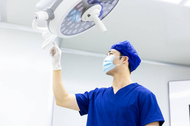 Male dentist check the medical equipment