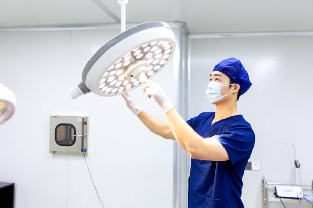 Male dentist check the medical equipment