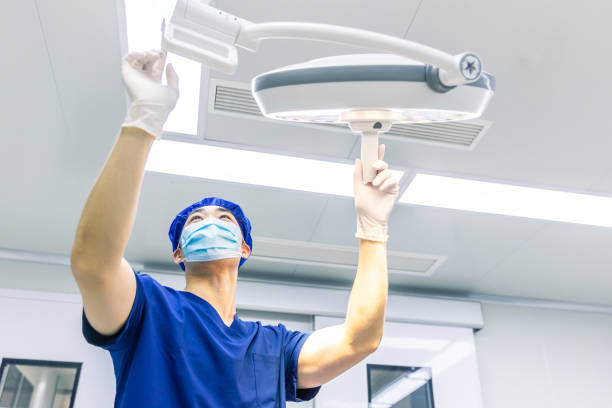 Male dentist check the medical equipment