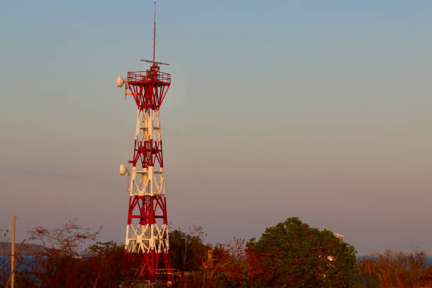 istock Cell tower against the background of the sunset sky. 2157804679