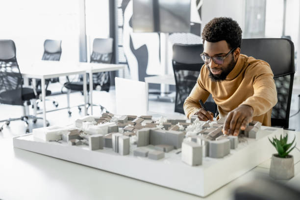 istock African american architect working in his office and looking involved 2157806430
