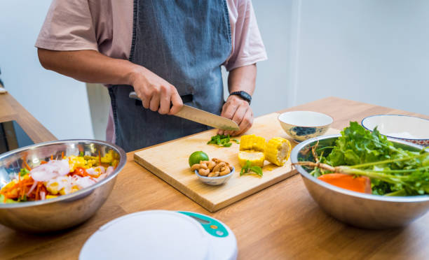 istock Chef at the kitchen preparing spicy glass noodle salad 2157807067