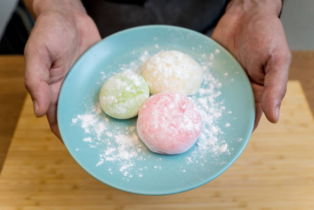 istock Different color delicious Japanese mochi on the blue plate 2157808944