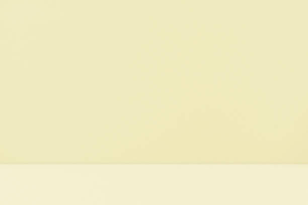 istock Empty yellow cream pastel room studio for product presentation. 2157811377