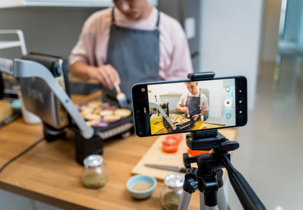 istock The chef is broadcasting live from workshop how to prepare a grilled eggplants with garlic 2157811961
