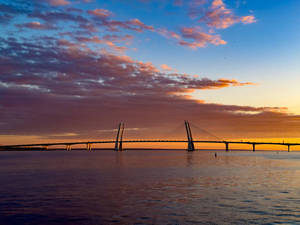 istock Stunning Sunset over Cable-Stayed Bridge and Calm Waters 2157813073
