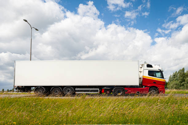 Large truck with long white loading space. Suitable to use for your own text or logo.