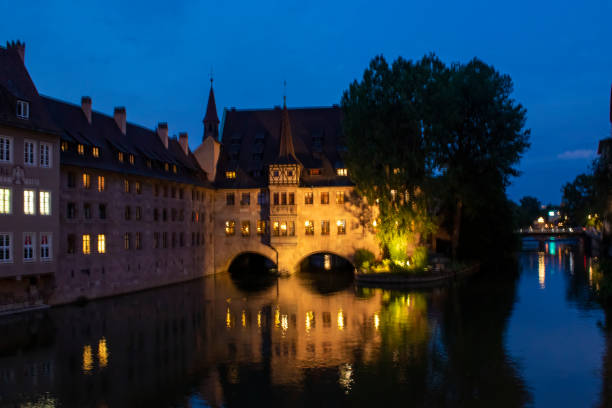 Heilig Geist Spital Nuremberg Bavaria Germany. Nuremberg and Pegnitz River.