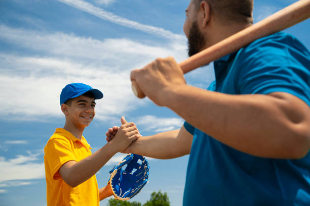 istock Father and son celebrating a good play 2157818616
