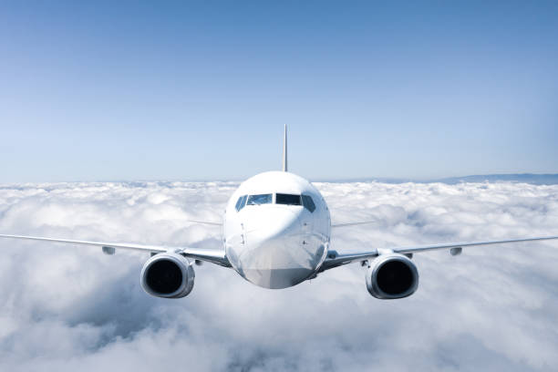 istock Passenger jet airplane flying above clouds 2157818844