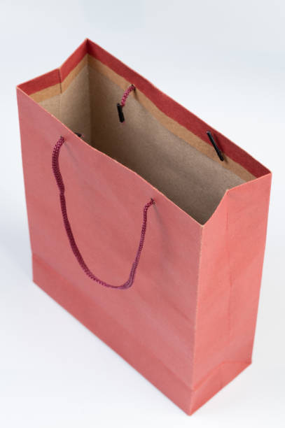 istock Pink paper bag with handles 2157818864