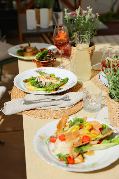 istock Serving Fresh Chicken Salad at Sunny Restaurant Terrace 2157822668