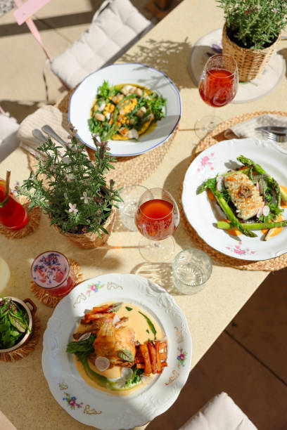 istock Serving Gourmet Dinner at Sunny Restaurant Terrace 2157822684