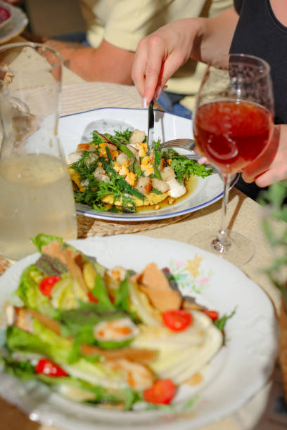 istock Enjoying Gourmet Dinner at Restaurant With Friends 2157822757